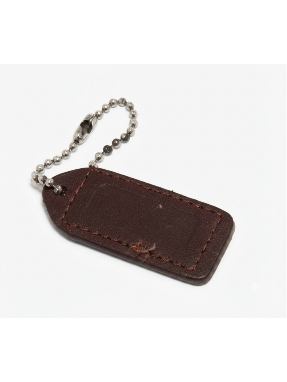 brown leather Coach hangtag bag charm